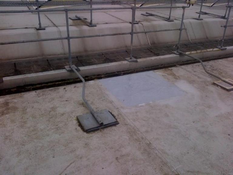 The mobile phone mast had been removed, leaving an area of roof to repair