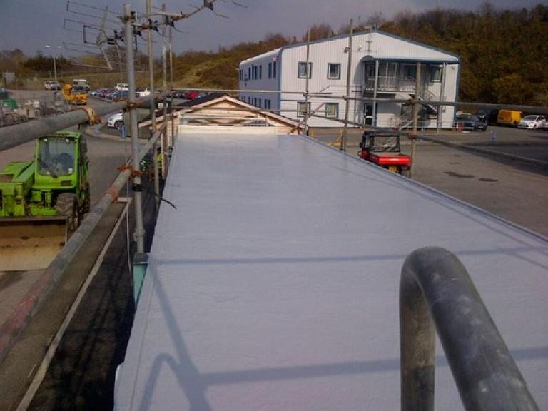 Creating the new 15 yr liquid membrane roof