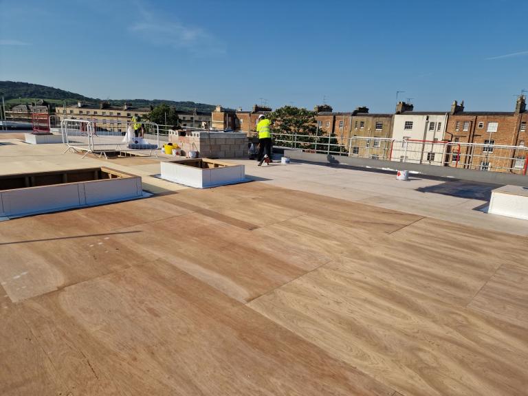 With the entire area covered, insulation could begin...
