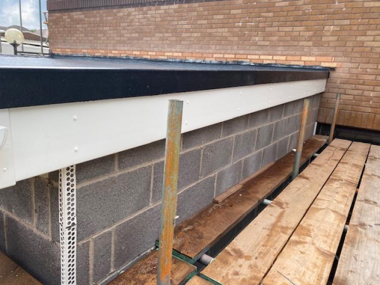 Note the additional protections where the polymer system meets the adjoining wall
