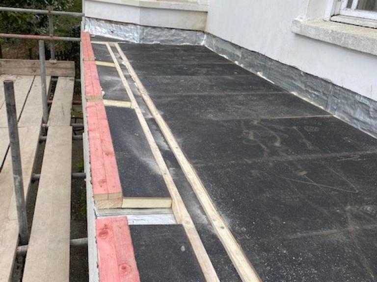 The freshly insulated roof with drainage channels