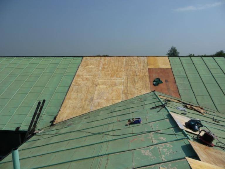 The church roof being boarded out and prepared