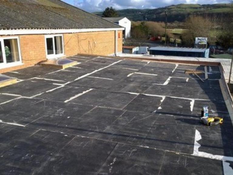 Tapered insulation was fitted over the whole area