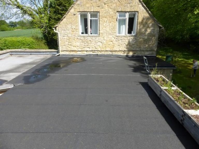 25m2 neighbouring roof also needed polymer treatment