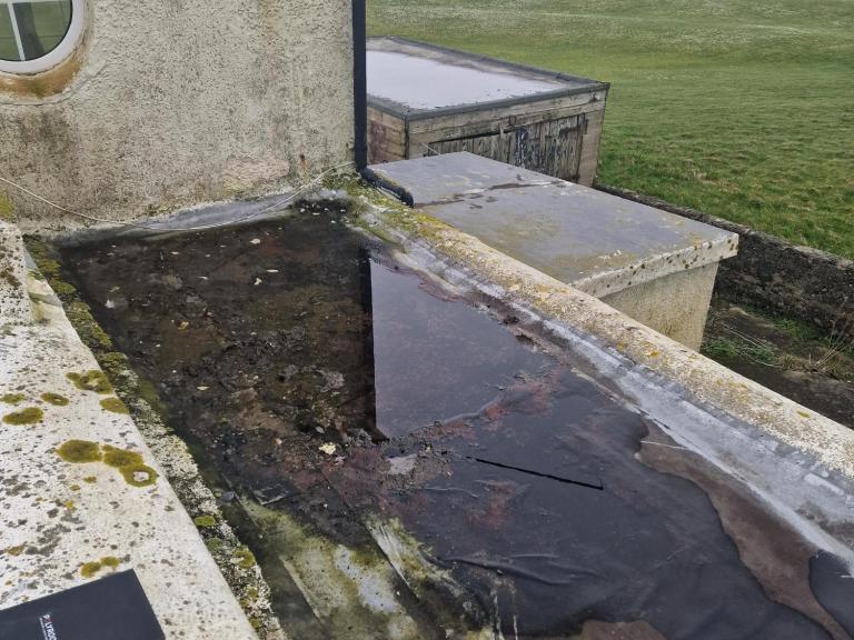 But the roof was in a state, with significant puddling
