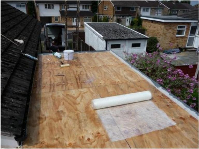 Overboarding added to existing roof to upgrade strength before finishing with smooth decking